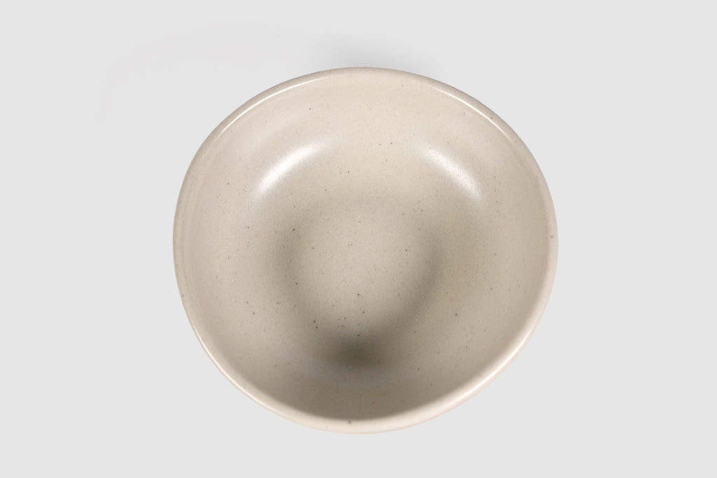 Bowl Sanka by Humo 1810 – black semi-matte stoneware, unglazed exterior, soft triangular form, 6.25 inch