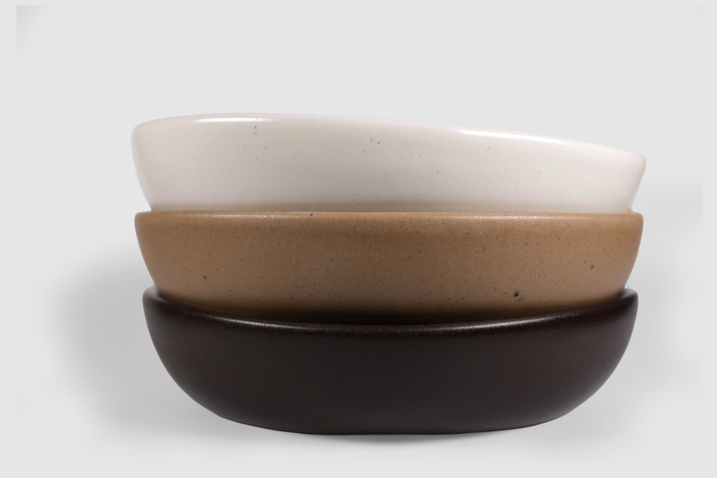 Pasta Triangular Plate by Humo 1810 – pardo stoneware, shallow coupe, soft triangular rim, 8.25 inch