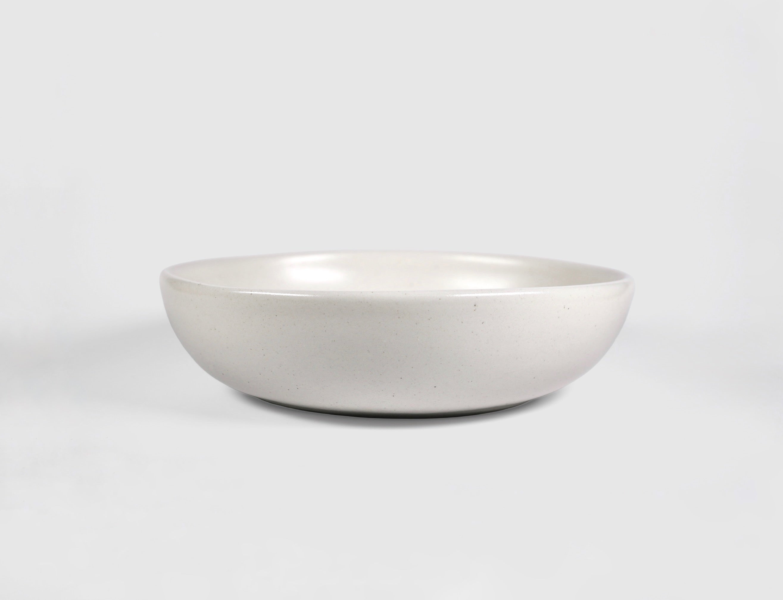 Pasta Triangular Plate by Humo 1810 – pardo stoneware, shallow coupe, soft triangular rim, 8.25 inch