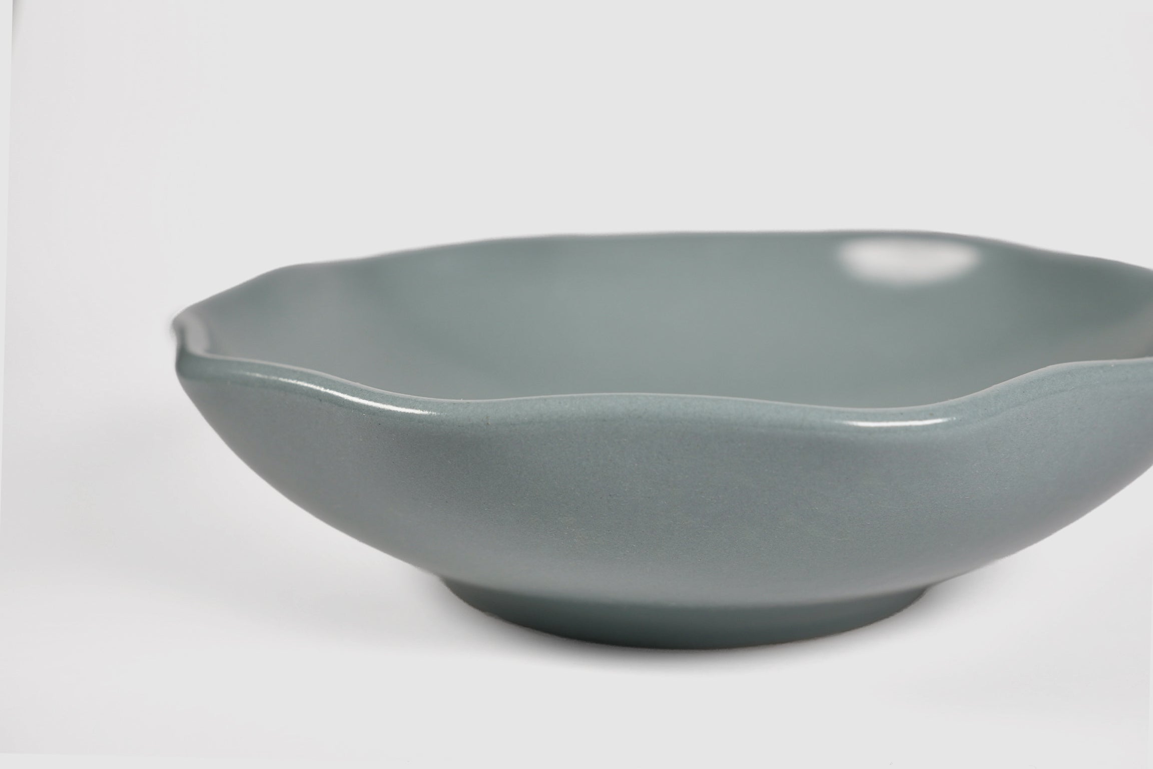 Bowl Safin by Humo 1810 – jade gloss stoneware, flowing undulating rim, wide 7.75 inch