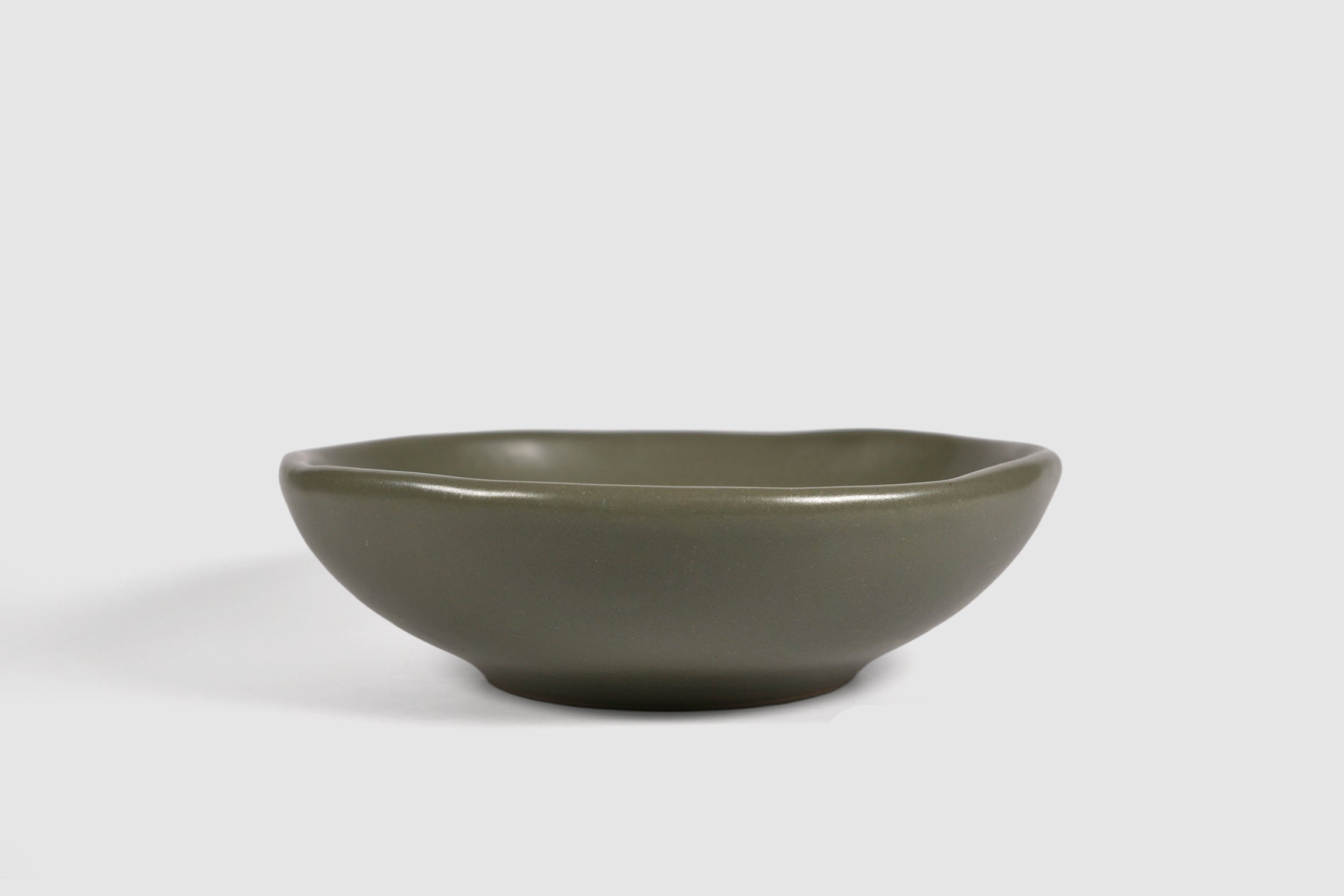 Bowl Safin by Humo 1810 – jade gloss stoneware, flowing undulating rim, wide 7.75 inch