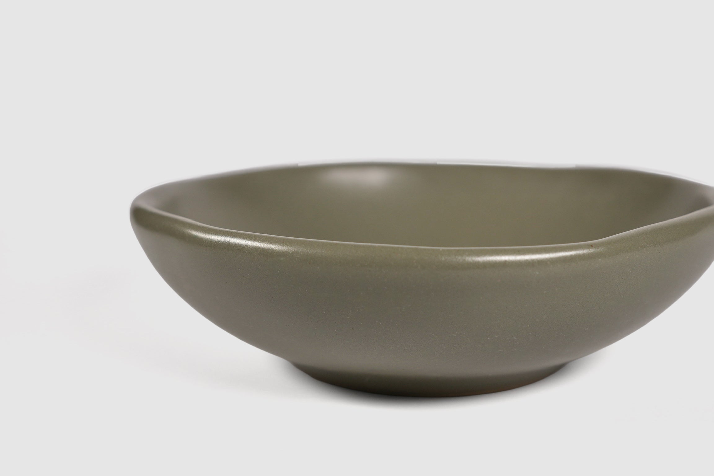 Bowl Safin by Humo 1810 – jade gloss stoneware, flowing undulating rim, wide 7.75 inch