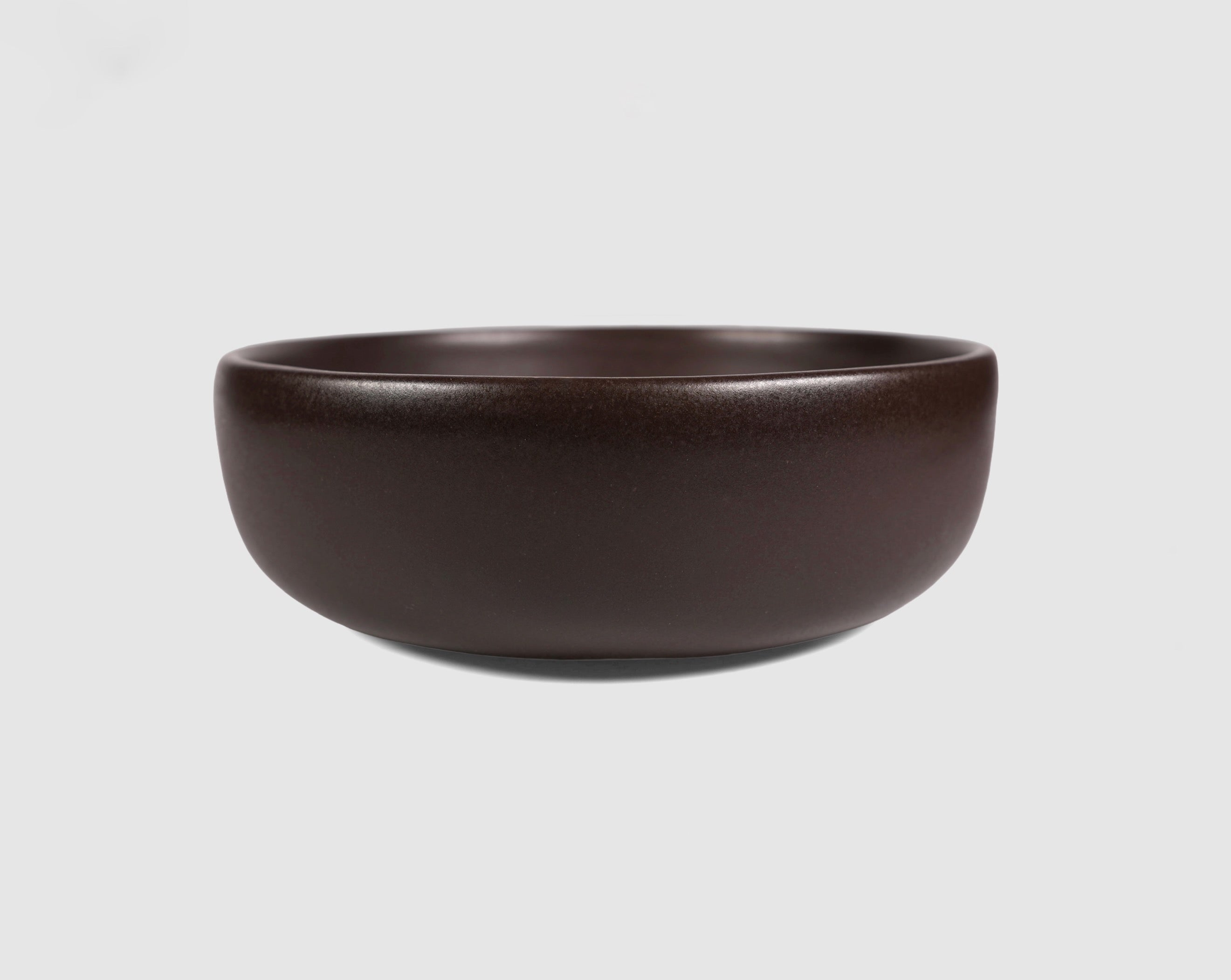 High Curved Bowl by Humo 1810 – deep stoneware, inward-curving walls, rolled matte rim, 8.25 inch