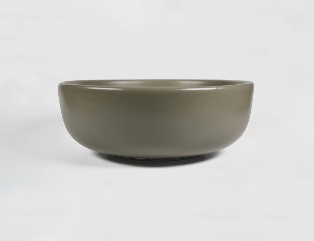 High Curved Bowl by Humo 1810 – deep stoneware, inward-curving walls, rolled matte rim, 8.25 inch