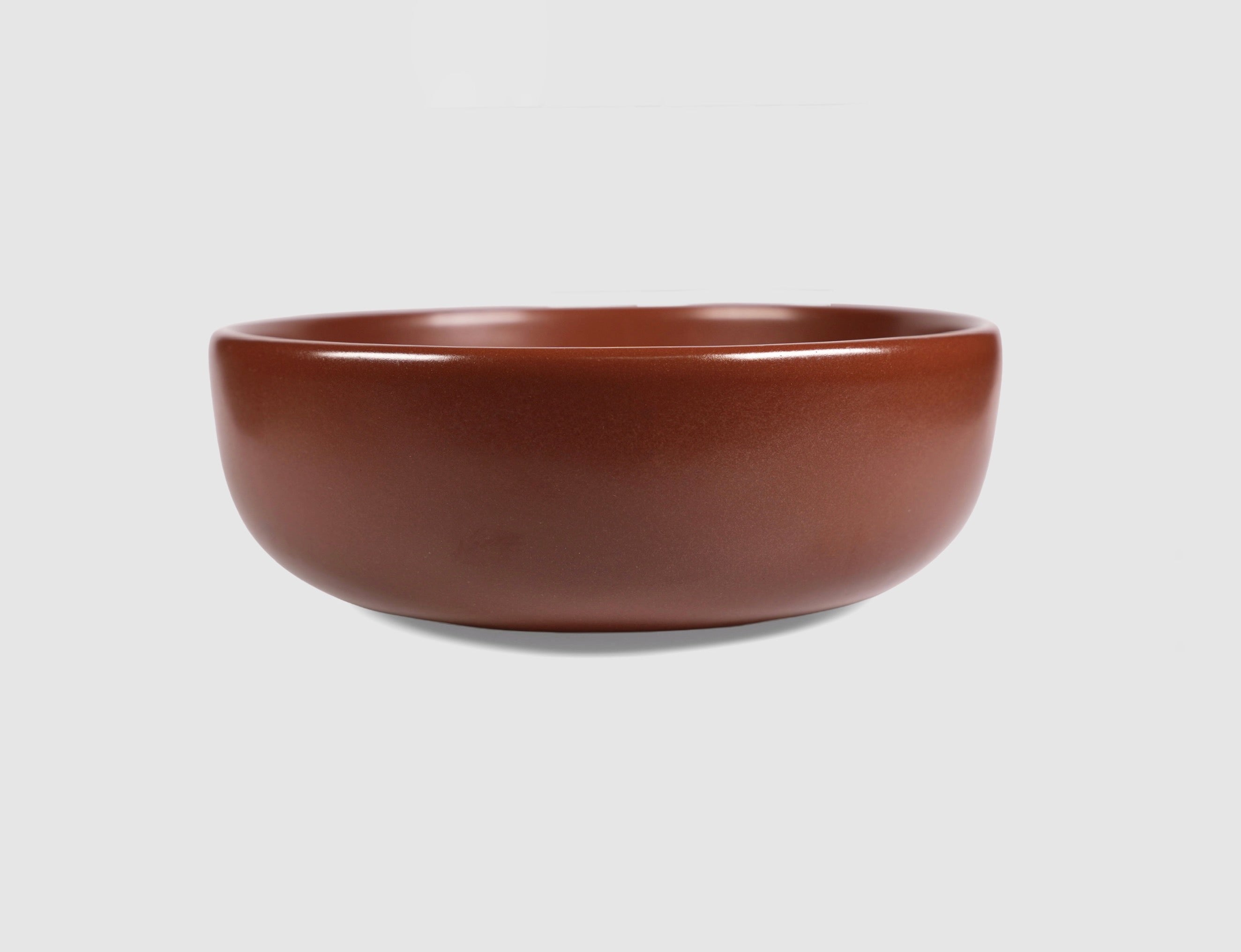 High Curved Bowl by Humo 1810 – deep stoneware, inward-curving walls, rolled matte rim, 8.25 inch