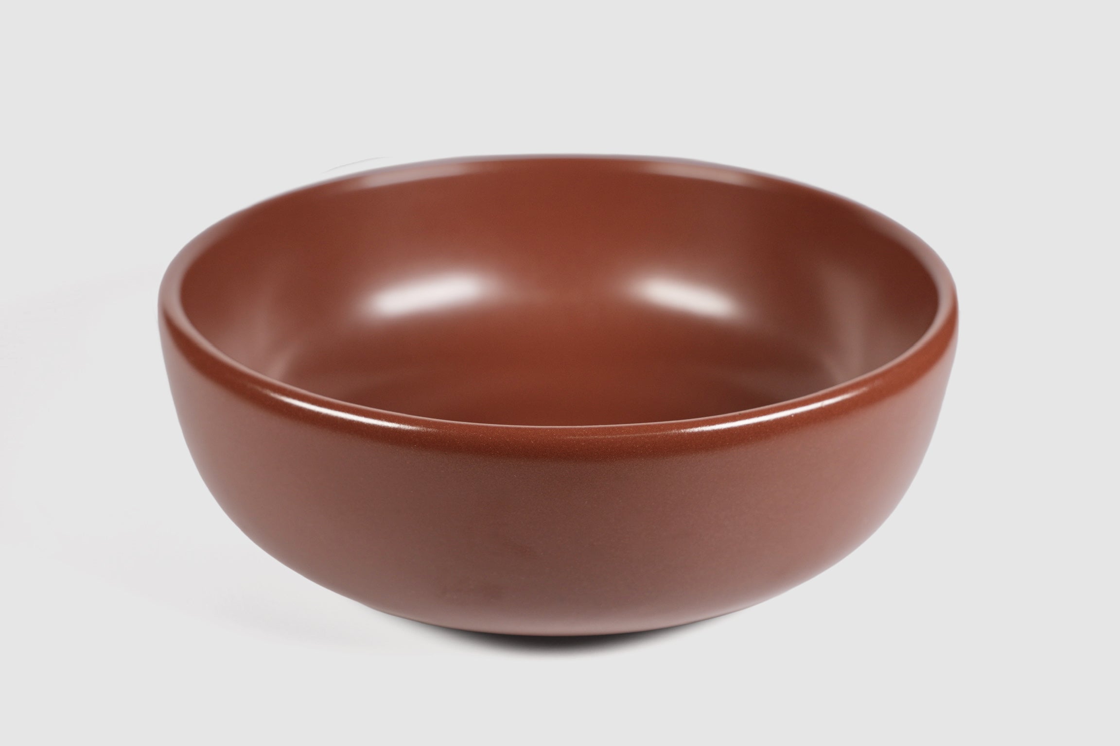 High Curved Bowl by Humo 1810 – deep stoneware, inward-curving walls, rolled matte rim, 8.25 inch