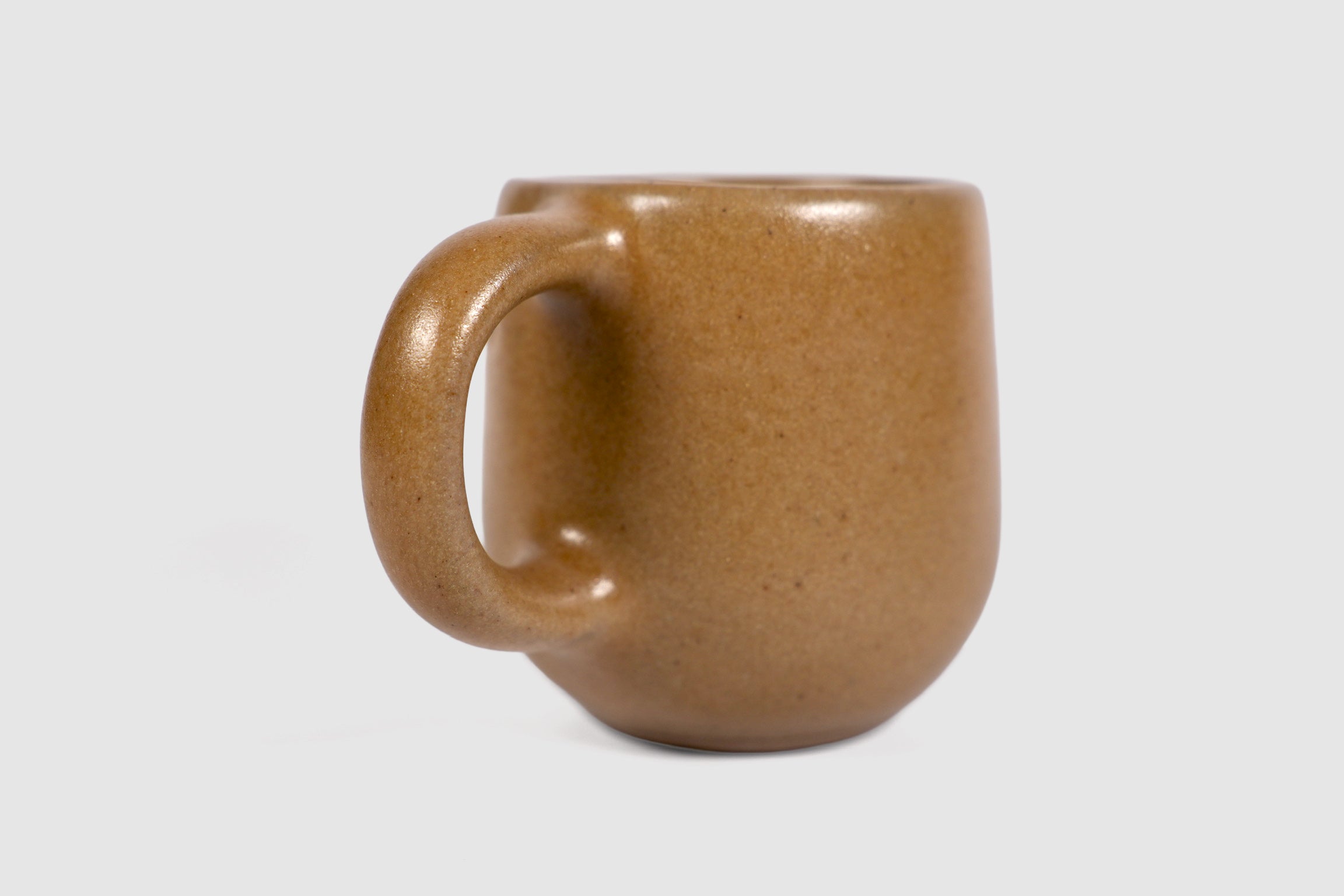 Small Pardo espresso mug with rounded belly and pulled loop handle