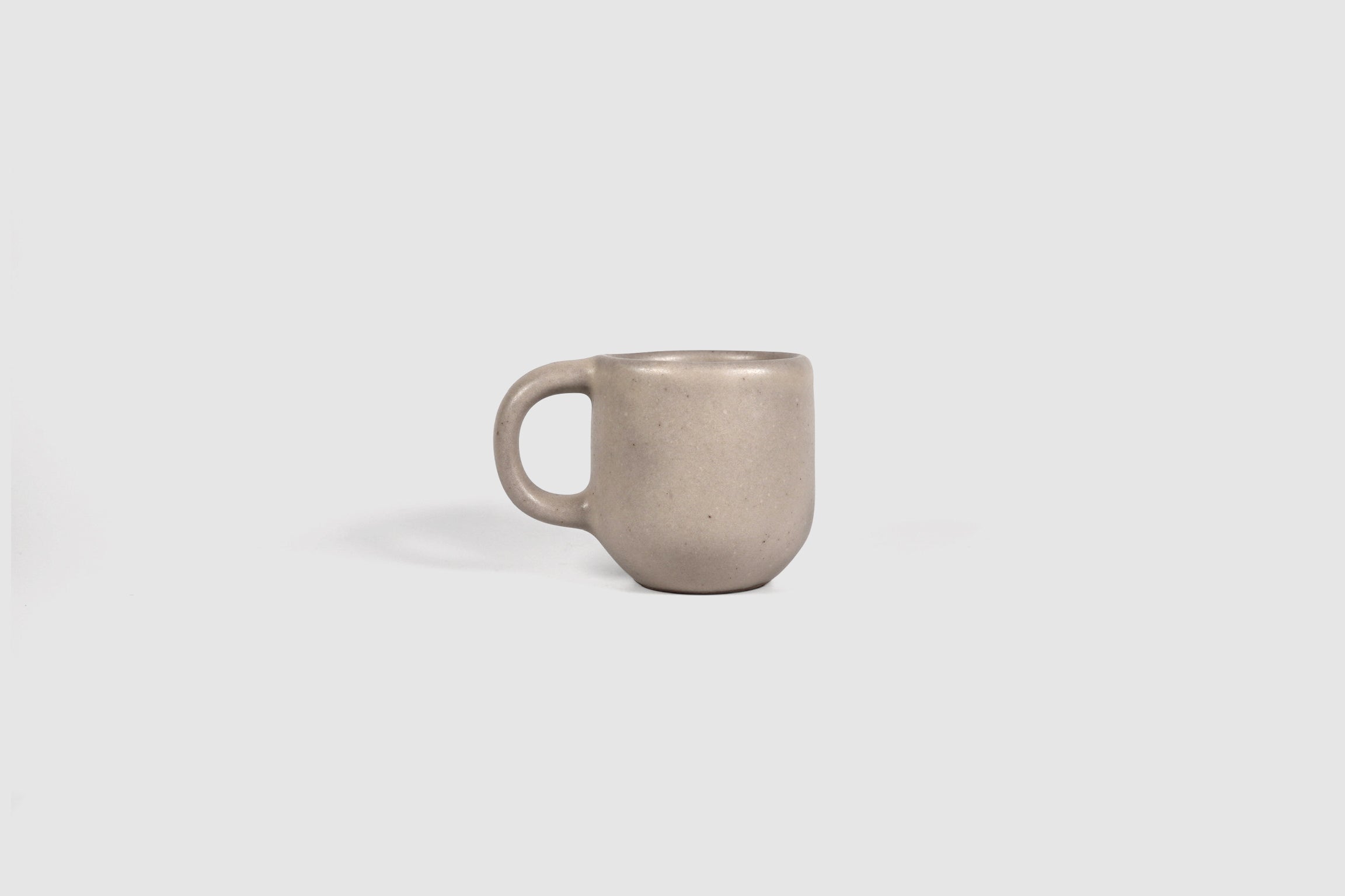 Small Pardo espresso mug with rounded belly and pulled loop handle