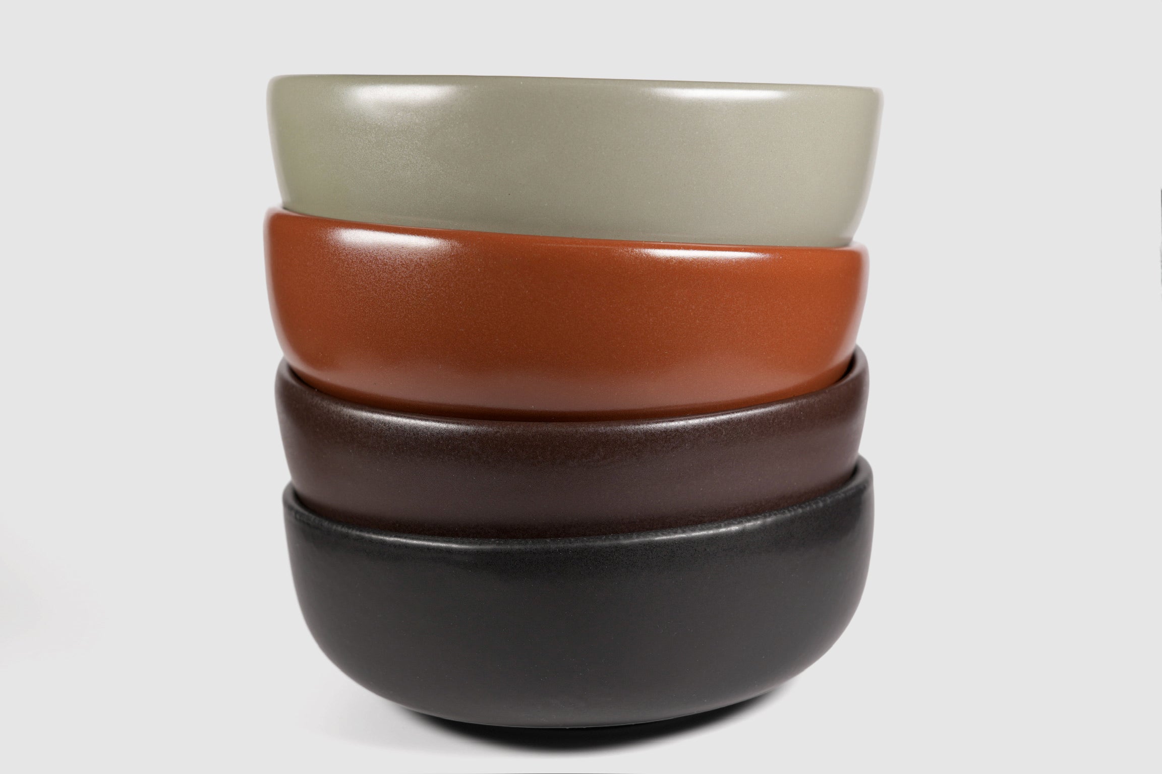 High Curved Bowl by Humo 1810 – deep stoneware, inward-curving walls, rolled matte rim, 8.25 inch