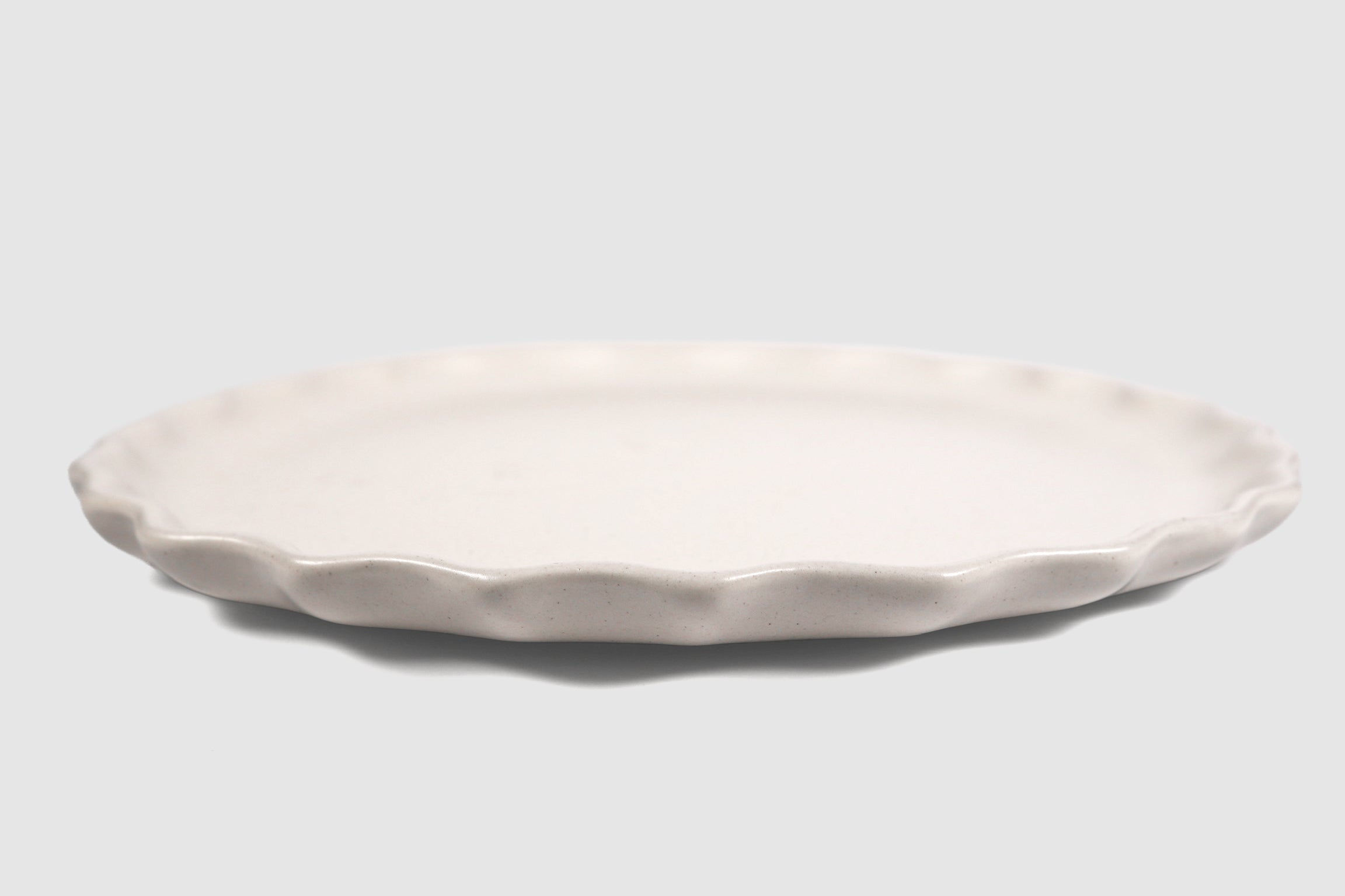 Dinner Plate Nami by Humo 1810 – chocolate stoneware, scalloped wave rim, 10.75 inch