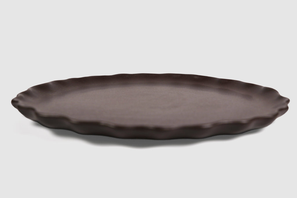 Dinner Plate Nami by Humo 1810 – chocolate stoneware, scalloped wave rim, 10.75 inch