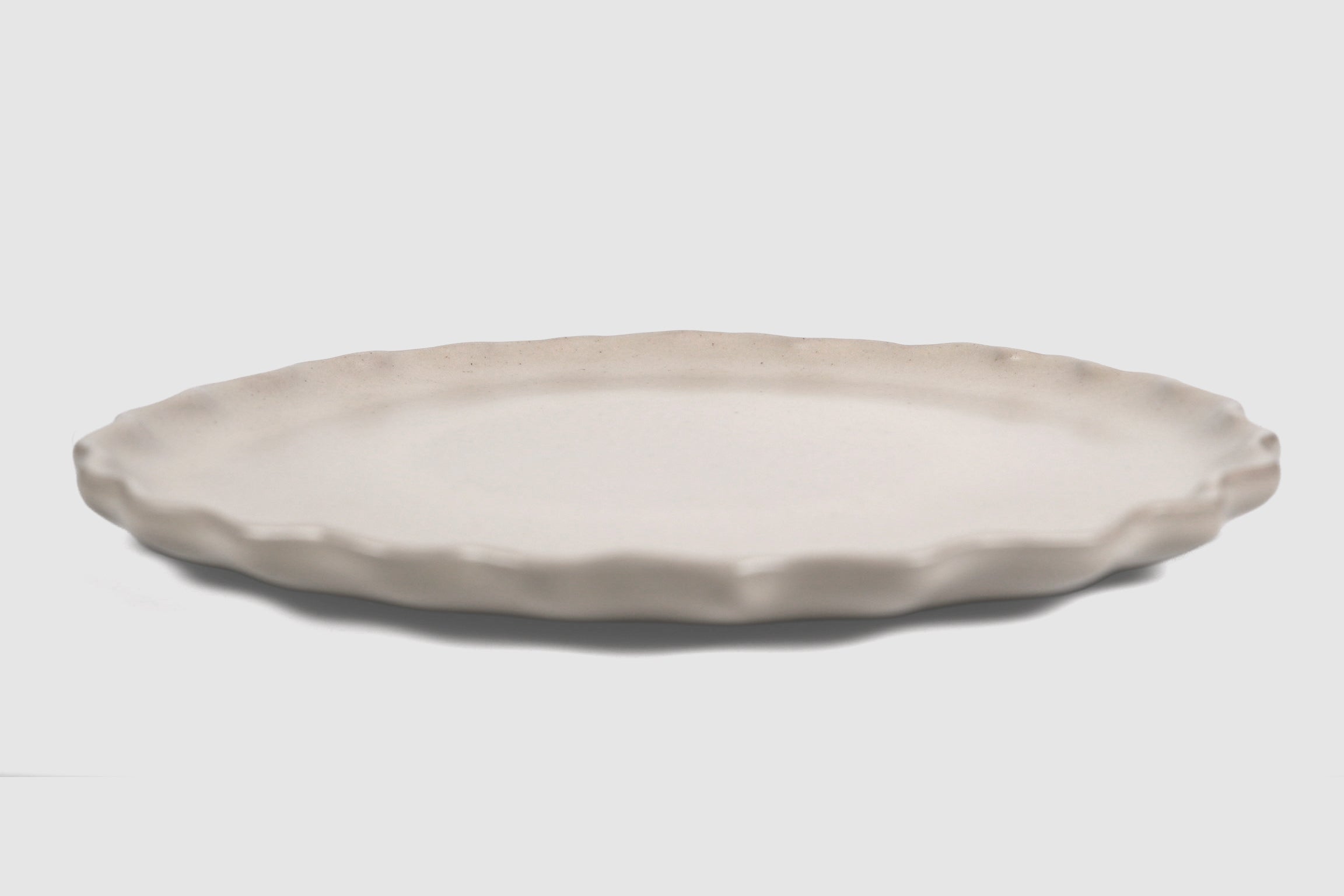 Dinner Plate Nami by Humo 1810 – chocolate stoneware, scalloped wave rim, 10.75 inch