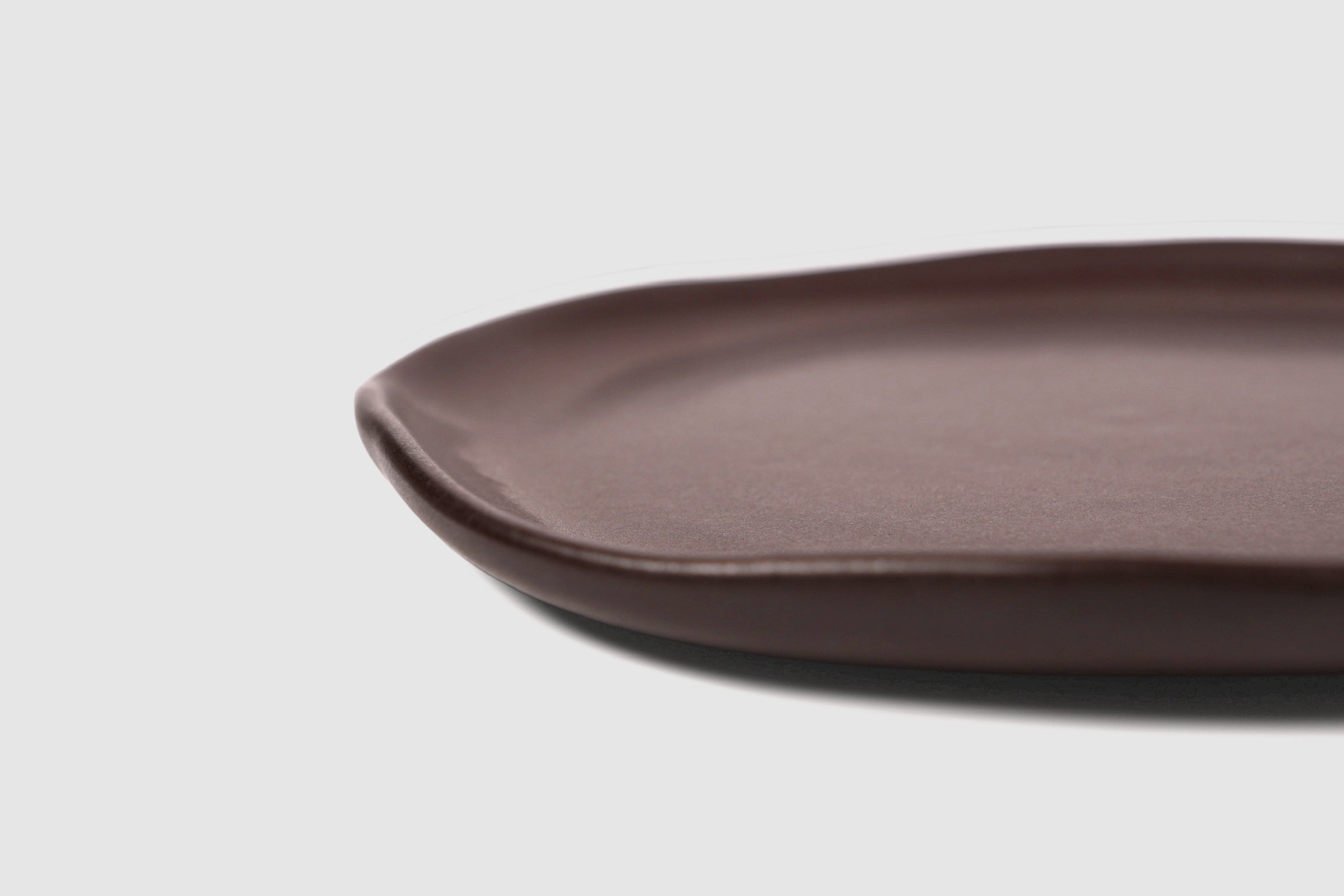 Dinner Plate Safin by Humo 1810 – olive green stoneware, gently undulating rim, 10.75 inch