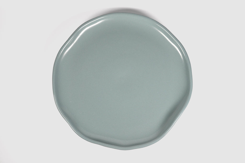 Dinner Plate Safin by Humo 1810 – olive green stoneware, gently undulating rim, 10.75 inch