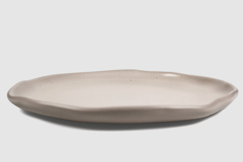 Dinner Plate Safin by Humo 1810 – olive green stoneware, gently undulating rim, 10.75 inch