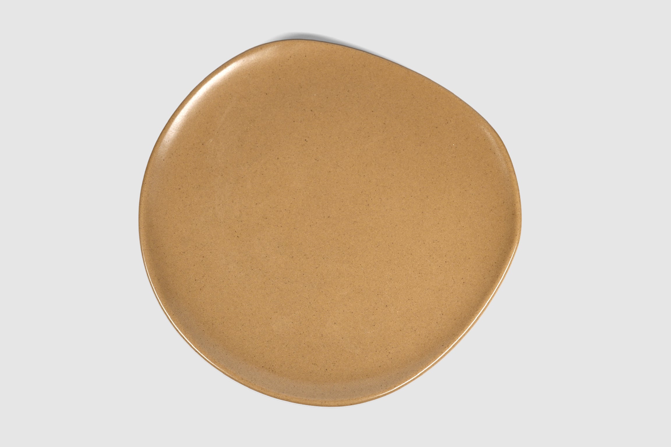 Dinner Plate Sanka by Humo 1810 – pardo stoneware, broad soft-triangle silhouette, 11 inch