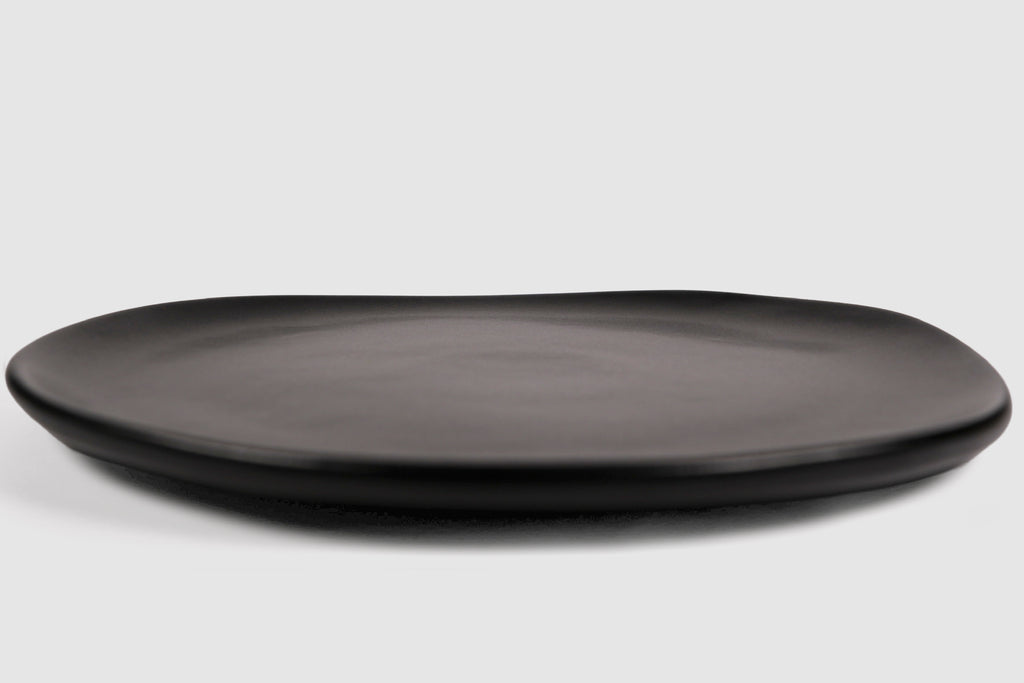 Dinner Plate Sanka by Humo 1810 – pardo stoneware, broad soft-triangle silhouette, 11 inch